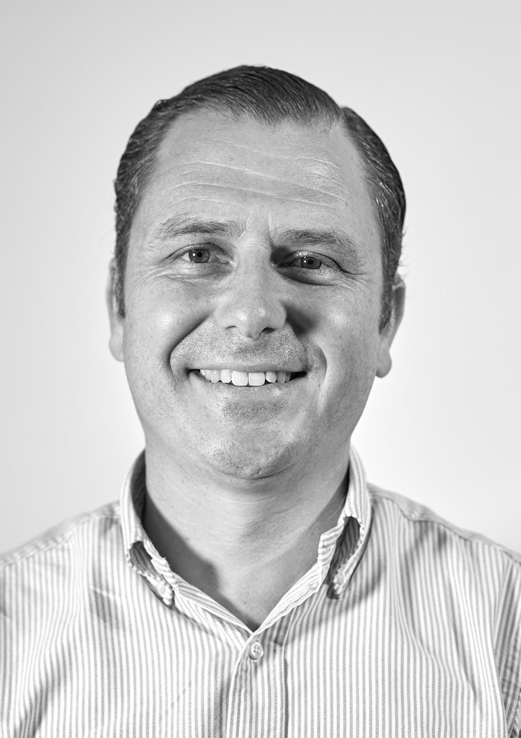 Black and White Headshot of AAG CEO Daniel Hawker